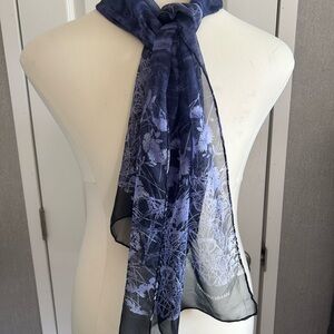 Dana Buchman sheer scarf featuring a blue and black floral print.